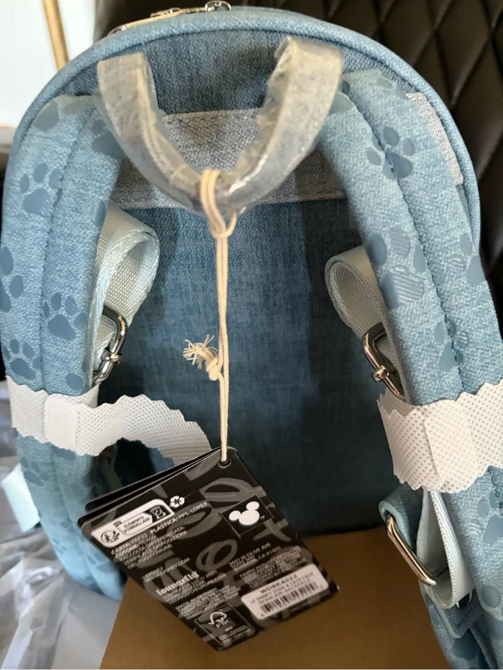 Loungefly Light Blue Denim Backpack with Pluto & Marie Embossed
